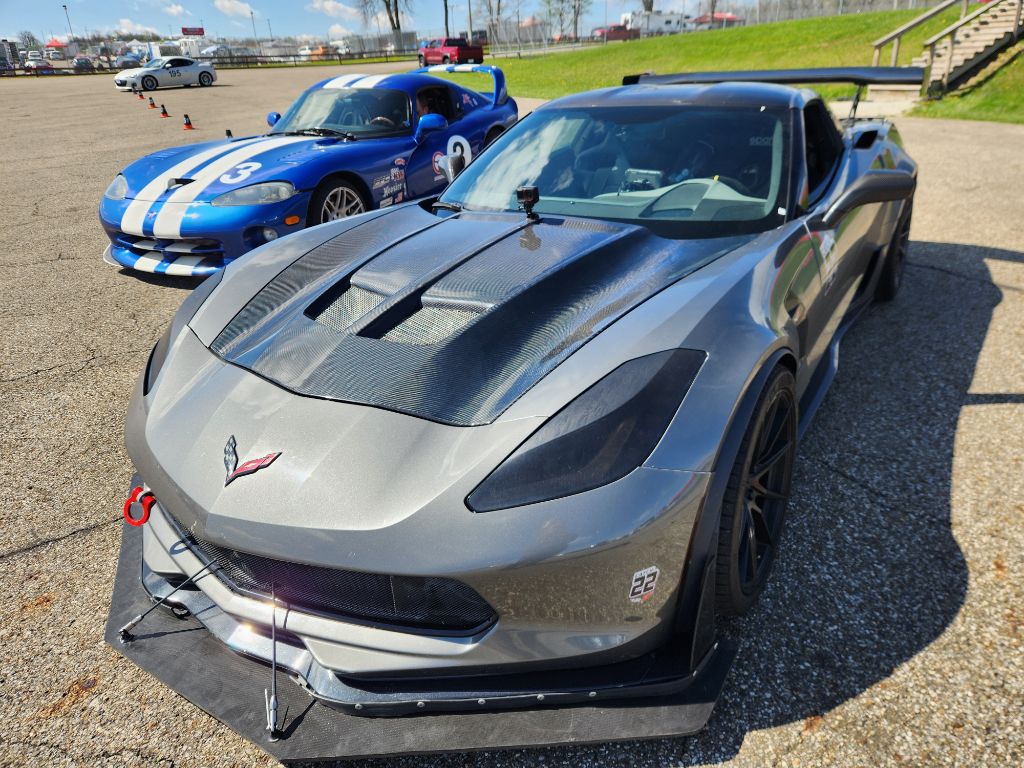 Corvette #22 at speed in the rain — track racing